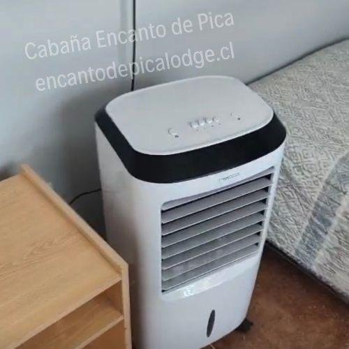 Aire acondicionado portátil en Encanto de Pica Lodge